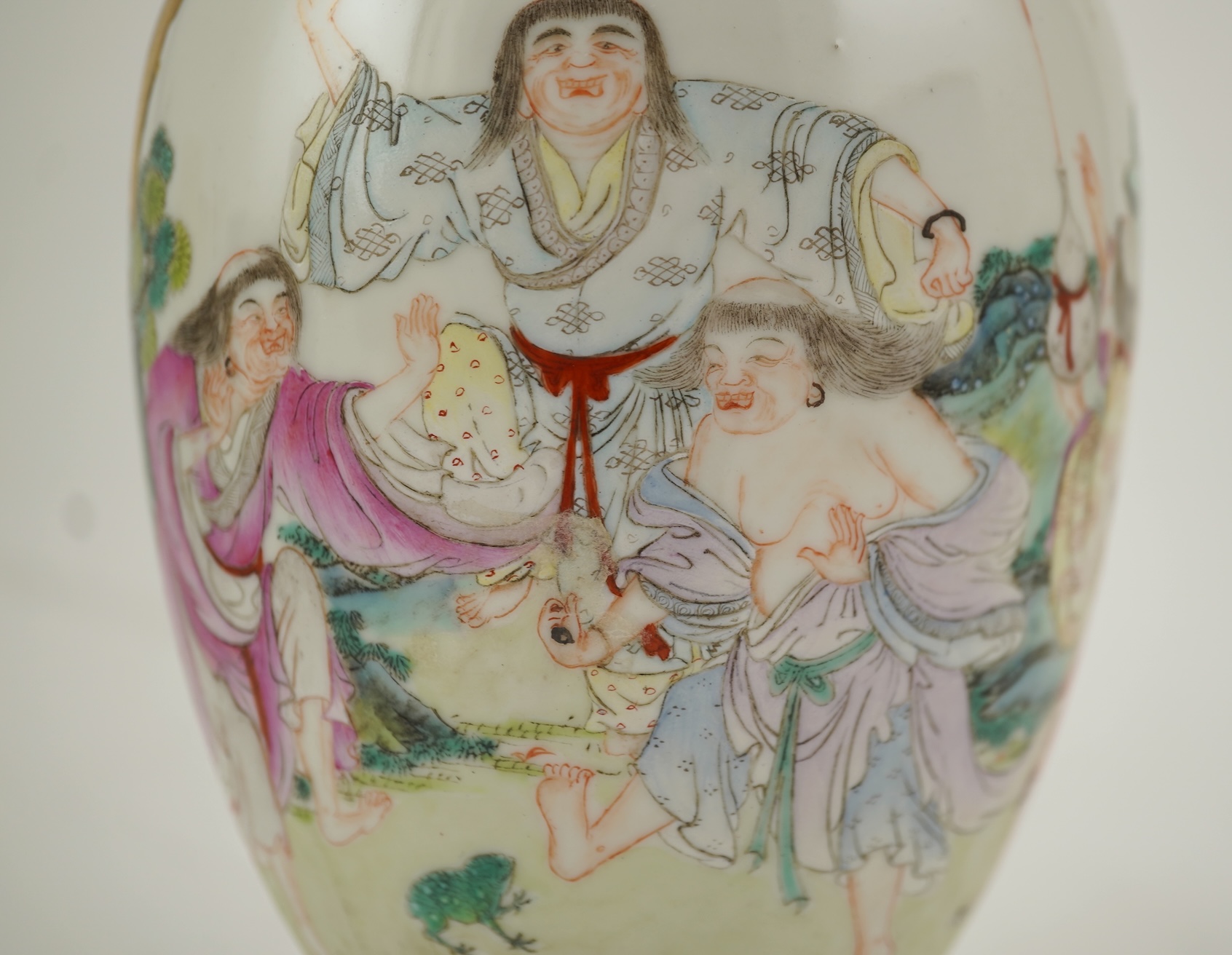 A Chinese famille rose ‘Liu Hai’ bottle vase, Qianlong six character seal mark but Republic period